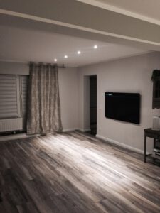 Boden verlegen - Laminat im Wohnzimmer